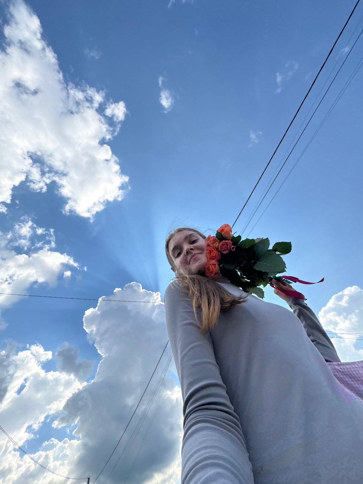 Lazy summer day with dogs, roses, and blue skies in Perm