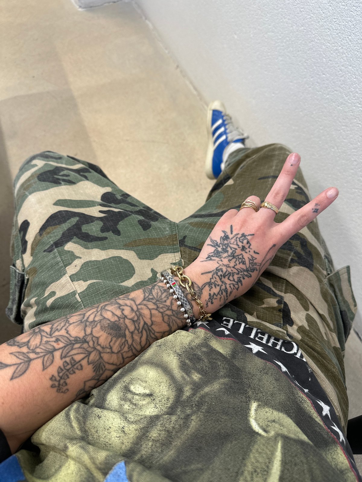 Tattooed individual spotted in alternative fashion in Paris