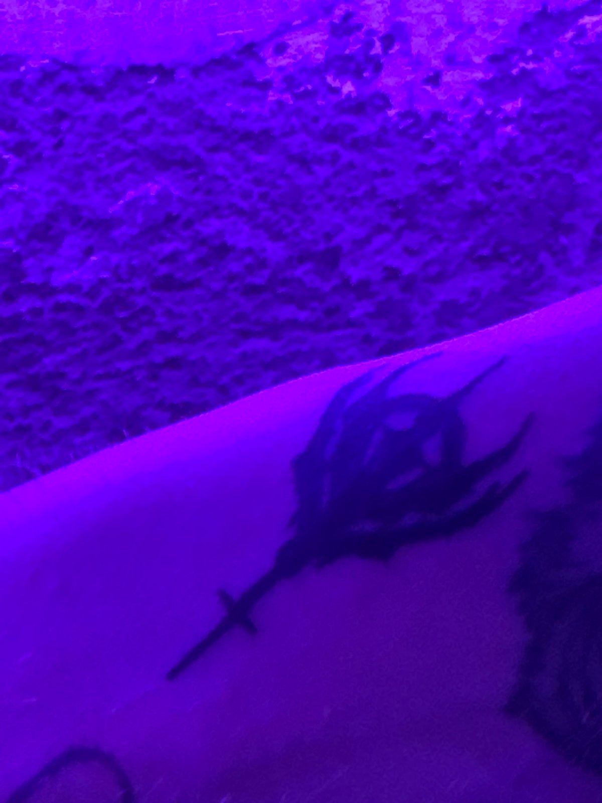 Barcelona resident shows off arm tattoos while smoking