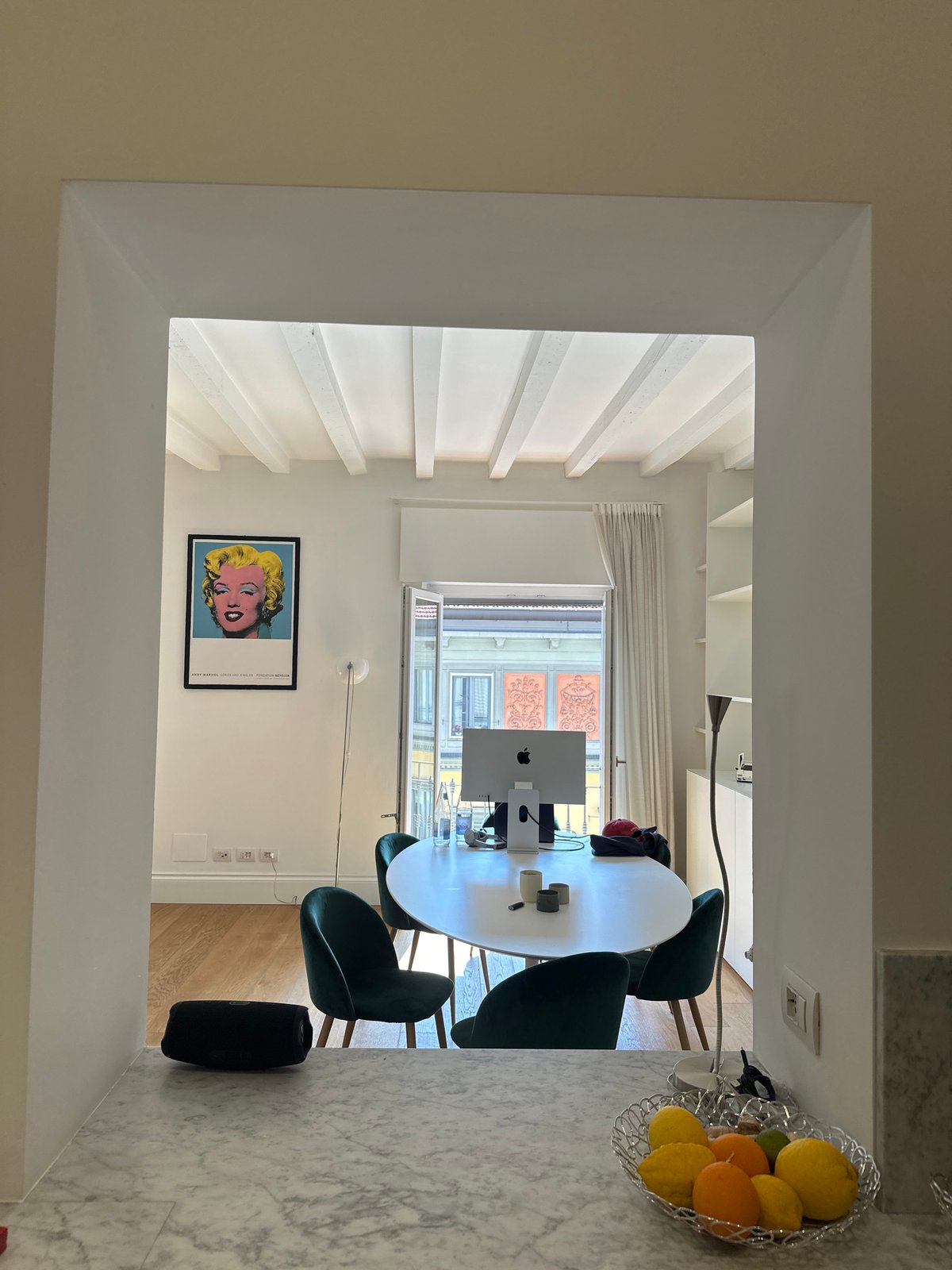 Kitchen food preparation documented in Milan apartment