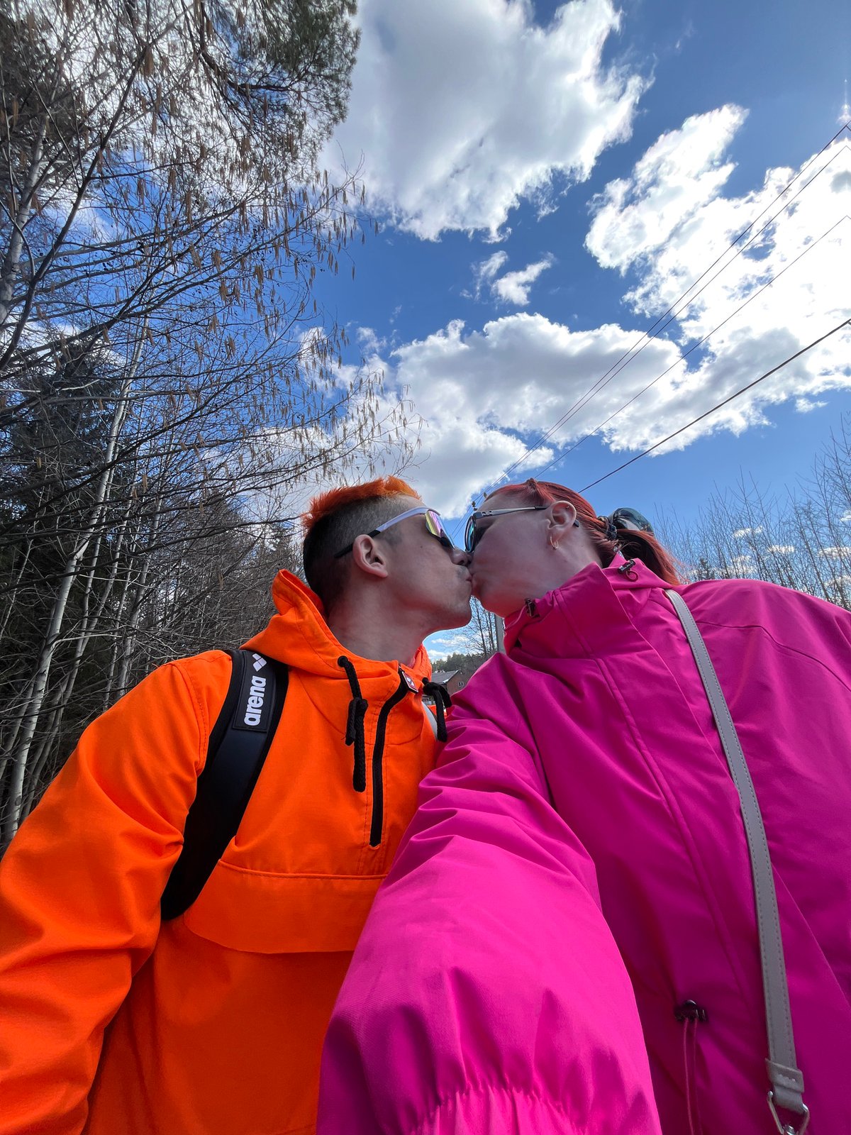 Couple enjoys outdoor stroll with baby in Chaikovsky