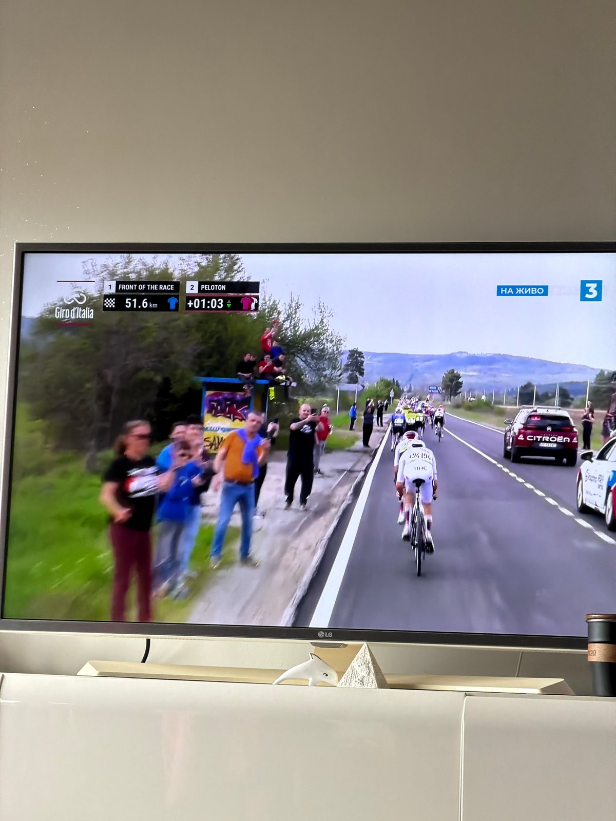 Plovdiv resident watches Giro d'Italia while eating lunch