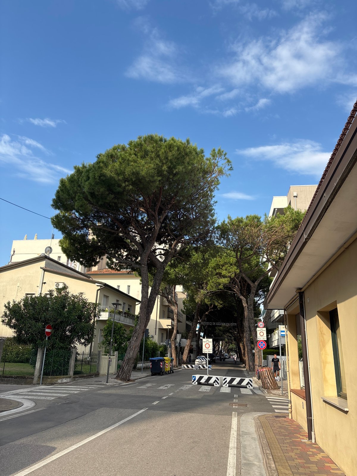 Young travelers board tour bus in Jesolo, Italy