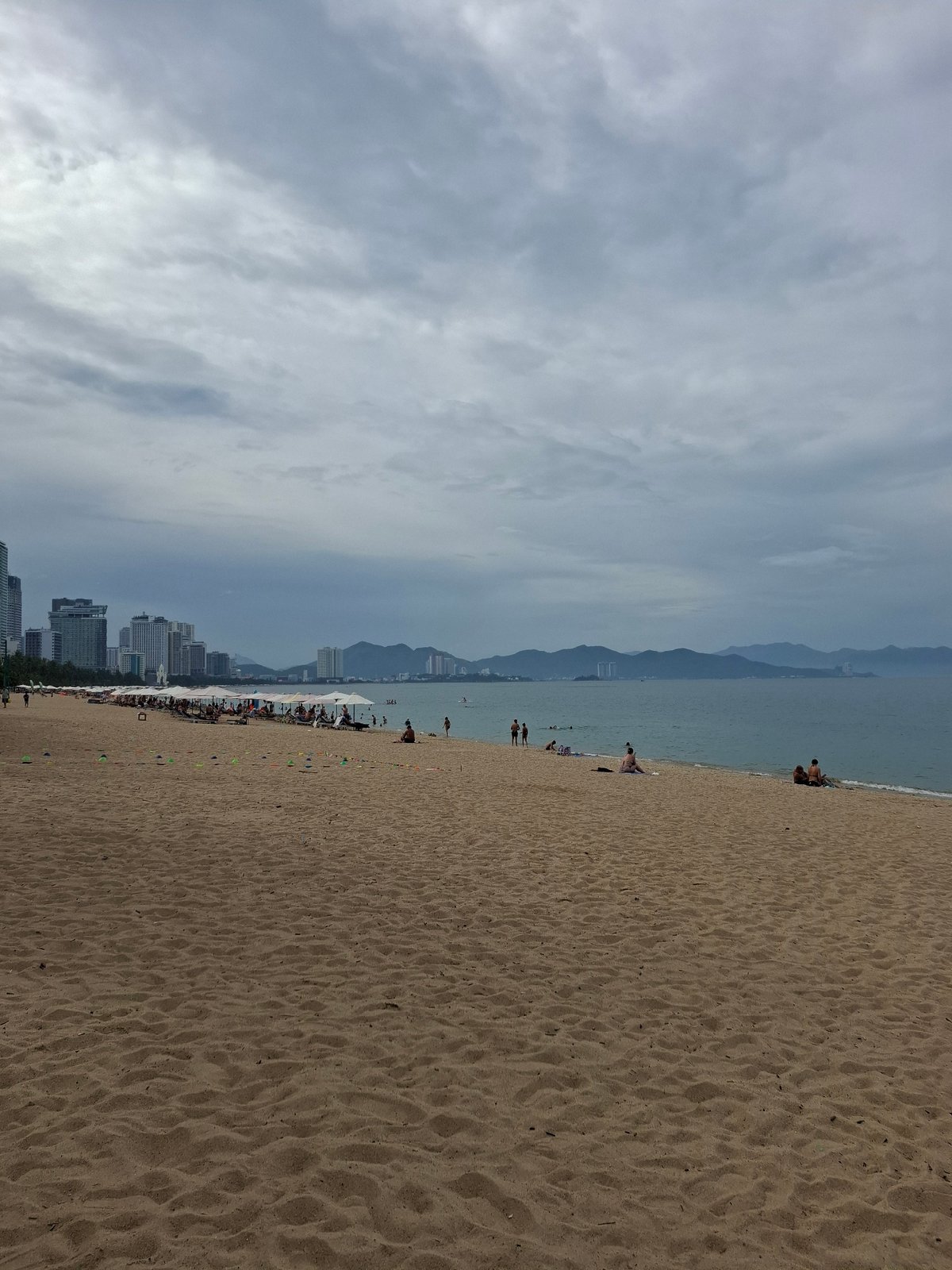 Cloudy morning at a busy Nha Trang beach