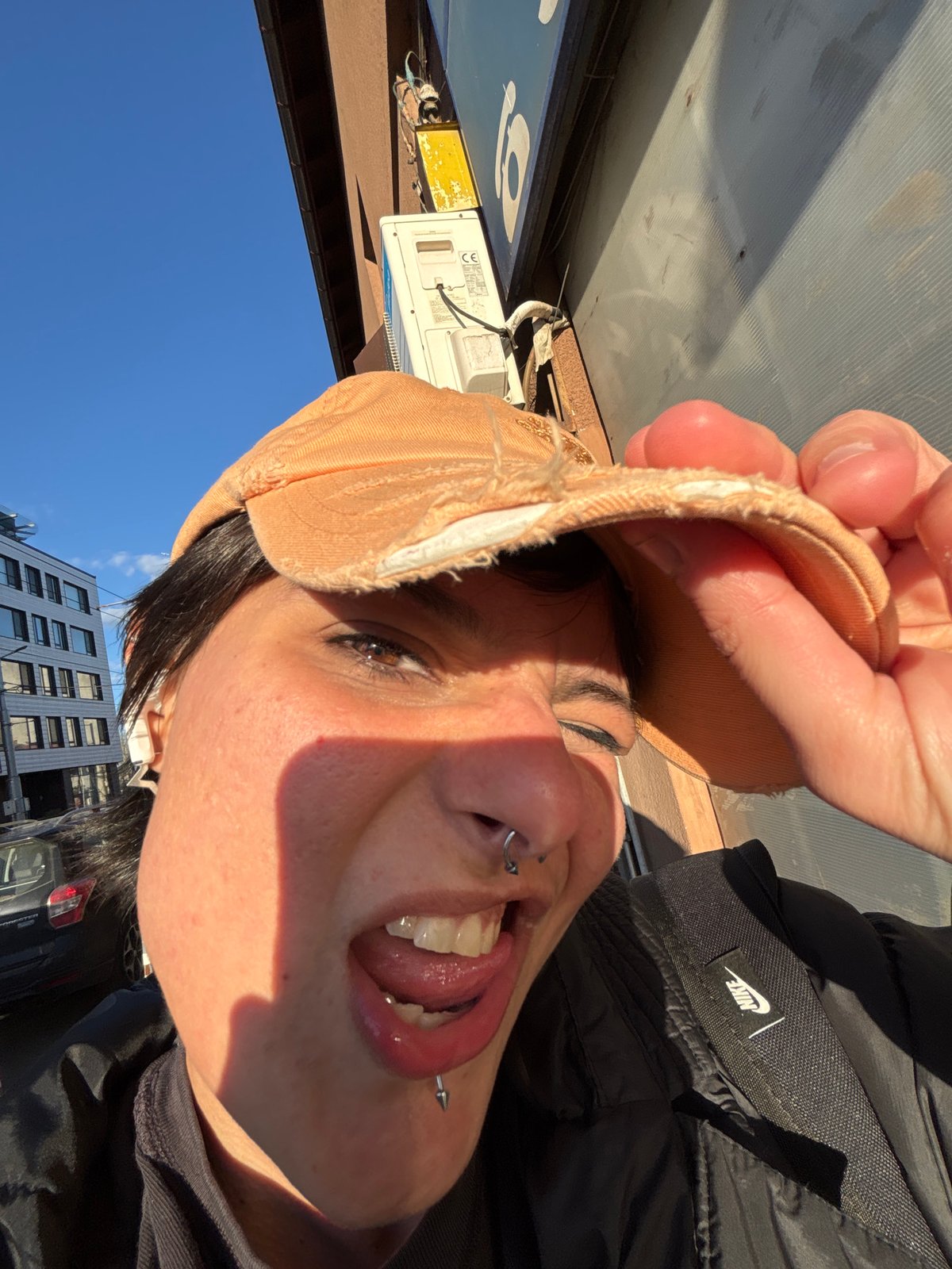 Person with piercings photographed multiple times in Sofia