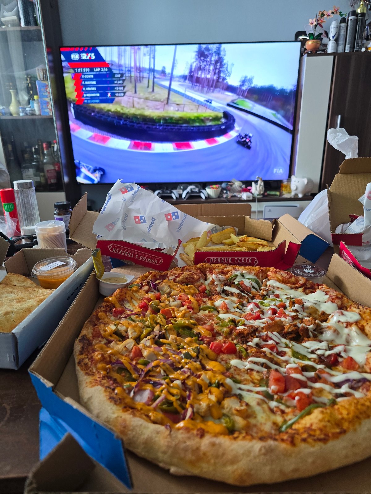 Partially eaten Domino's pizza observed in Sofia home