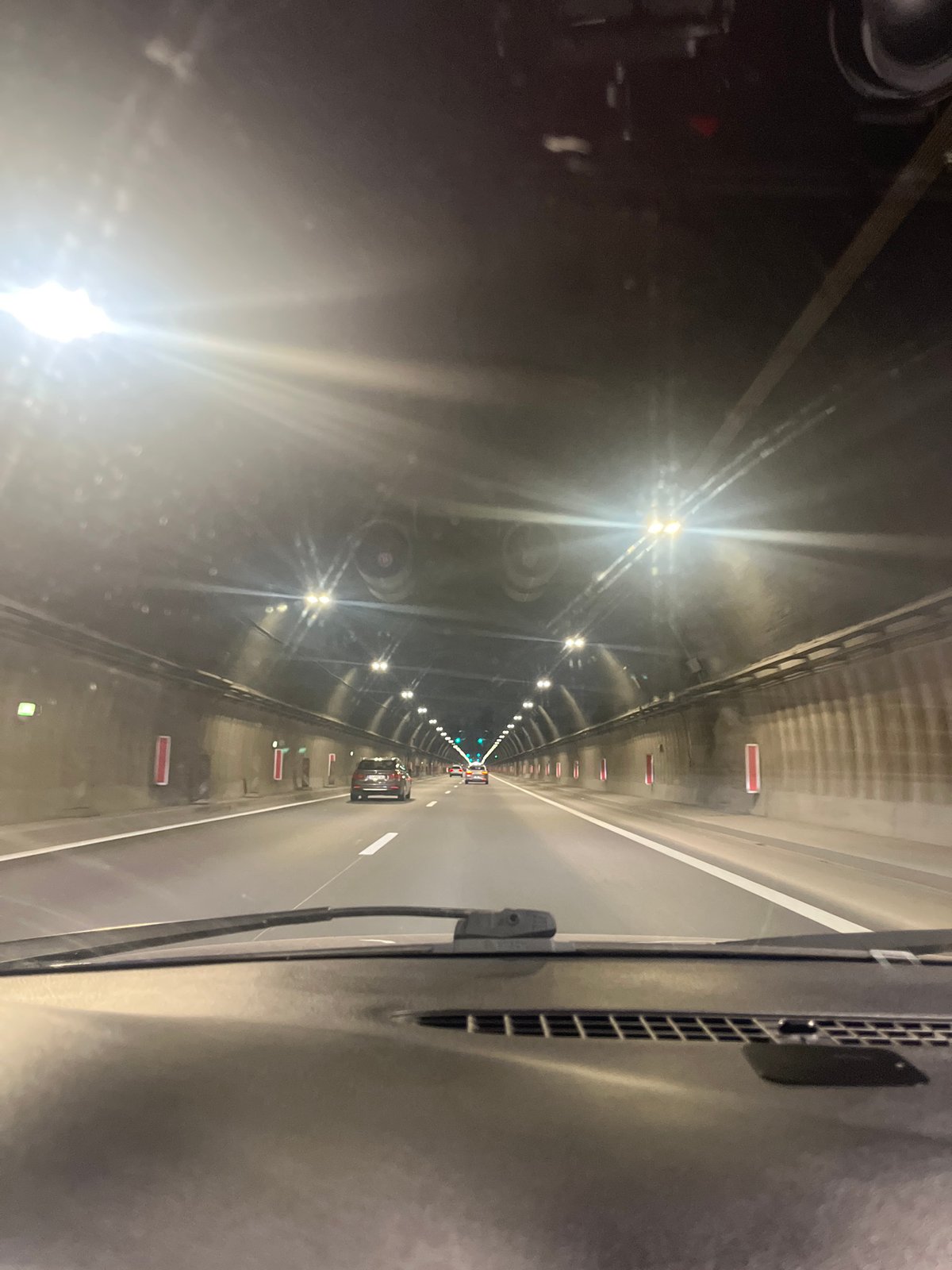 Underground tunnel with vehicles observed by witness
