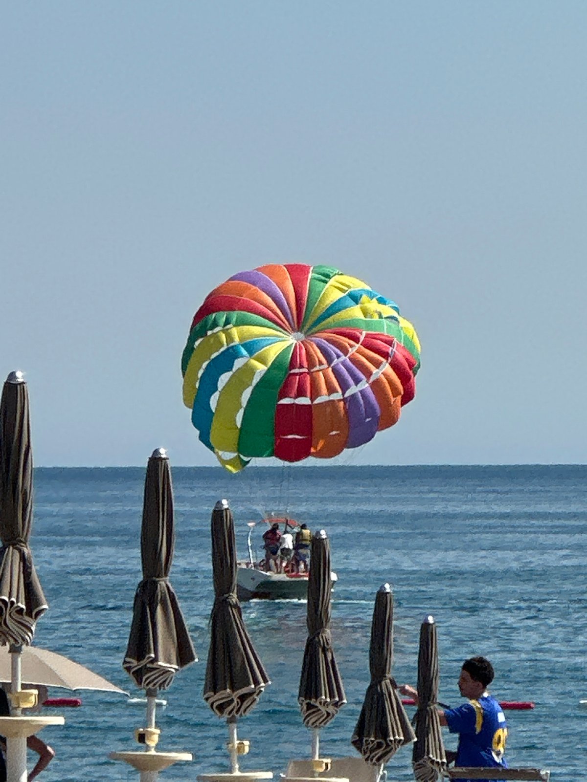 Parasailer spotted over Montenegro coast during afternoon beach hours