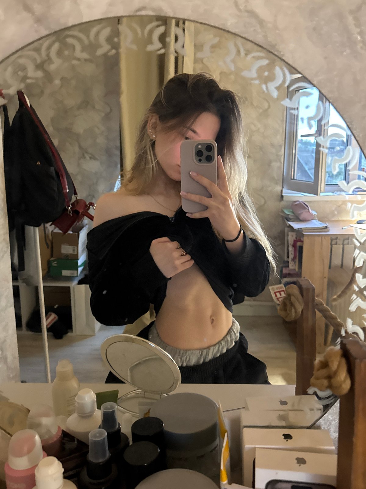 Young woman photographed in multiple poses at Noviy residence