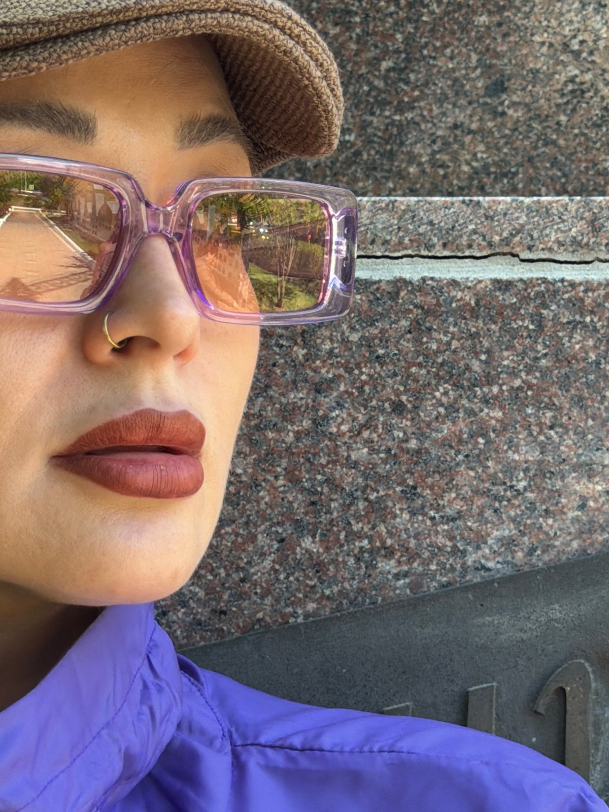 Woman in purple sunglasses photographed in outdoor session, Krasnoyarsk