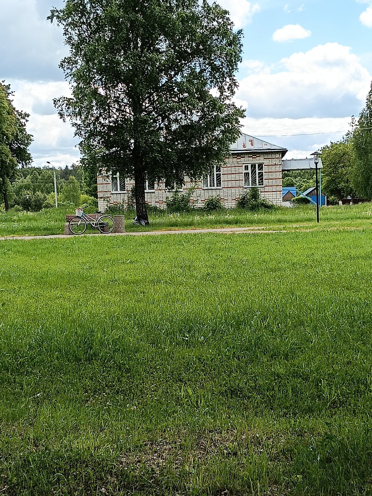 Woman documents morning park walk in Красный Маяк, Russia