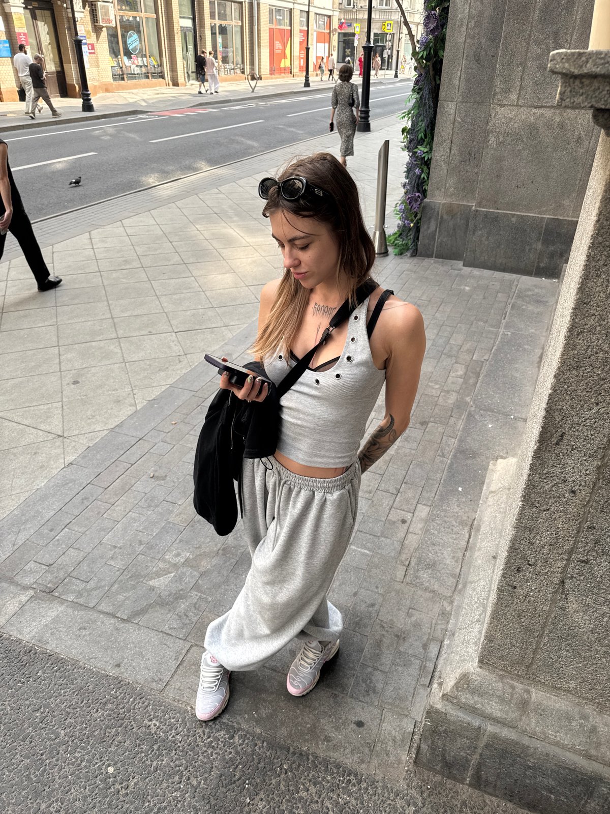 Young woman's casual afternoon documented across central Moscow landmarks