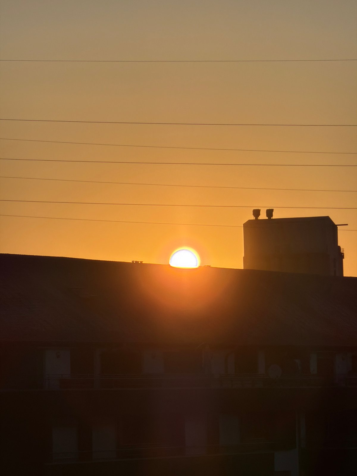 Sunrise over Esch-sur-Alzette: rooftops, wetlands, and wildlife