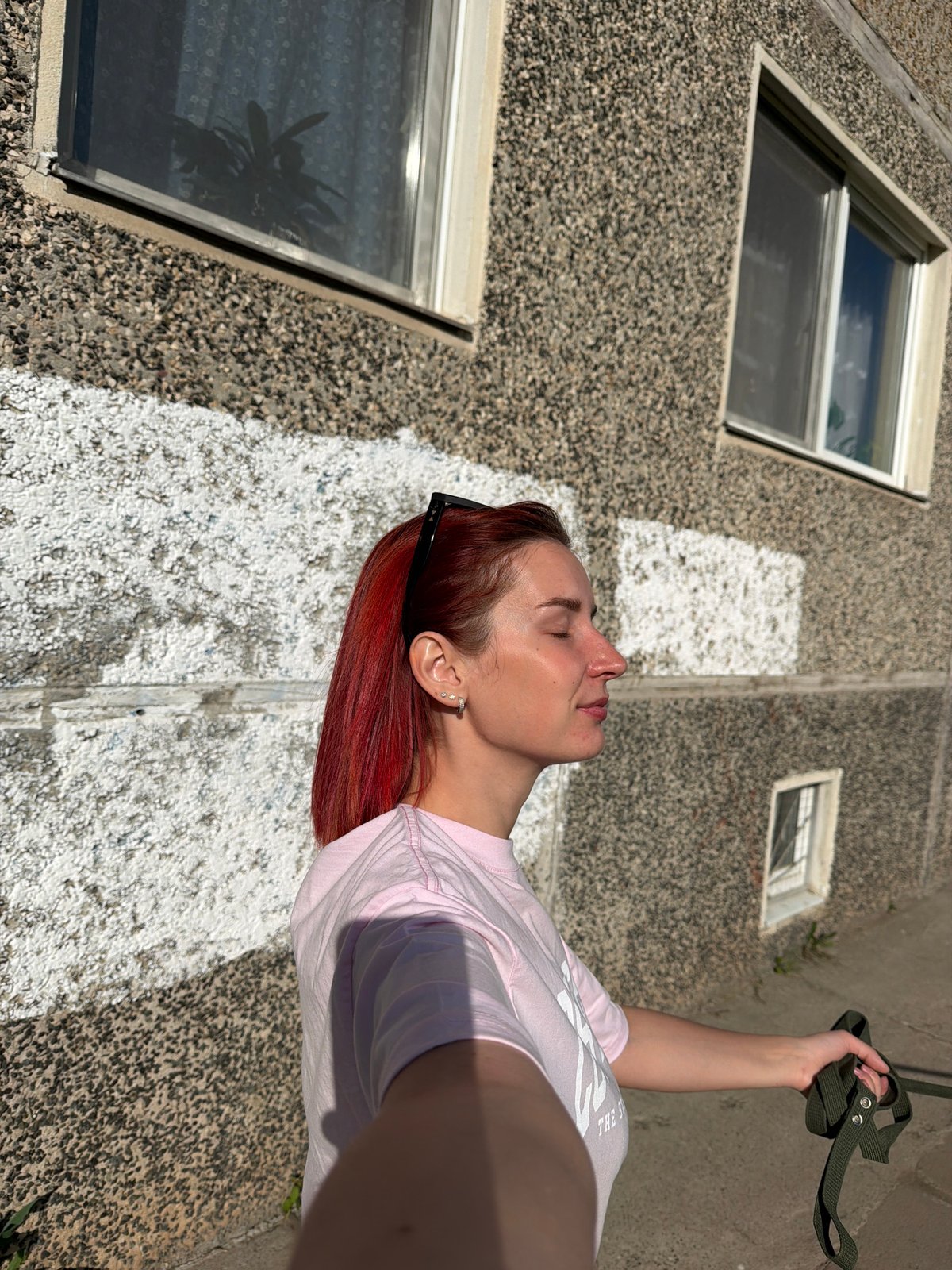 Woman walks dog, takes selfies in Chaikovsky park area