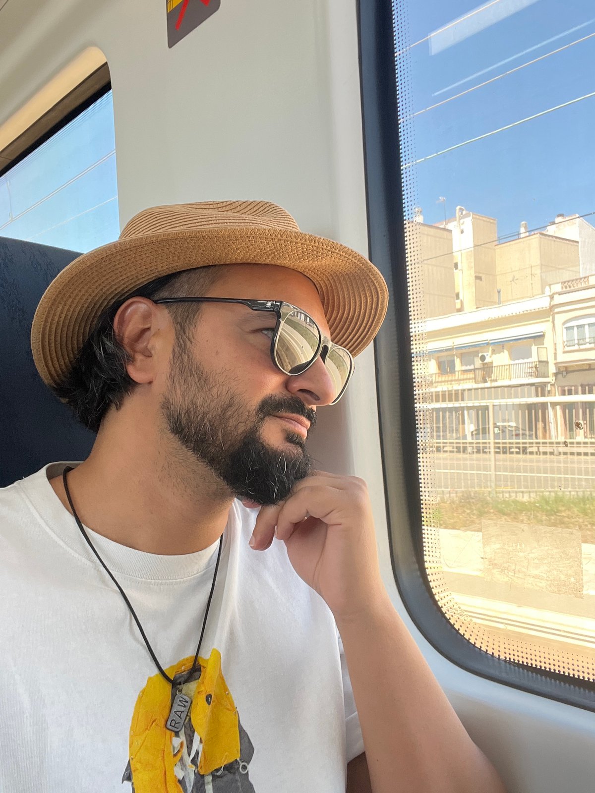 Train passenger rests during journey in Premià de Mar