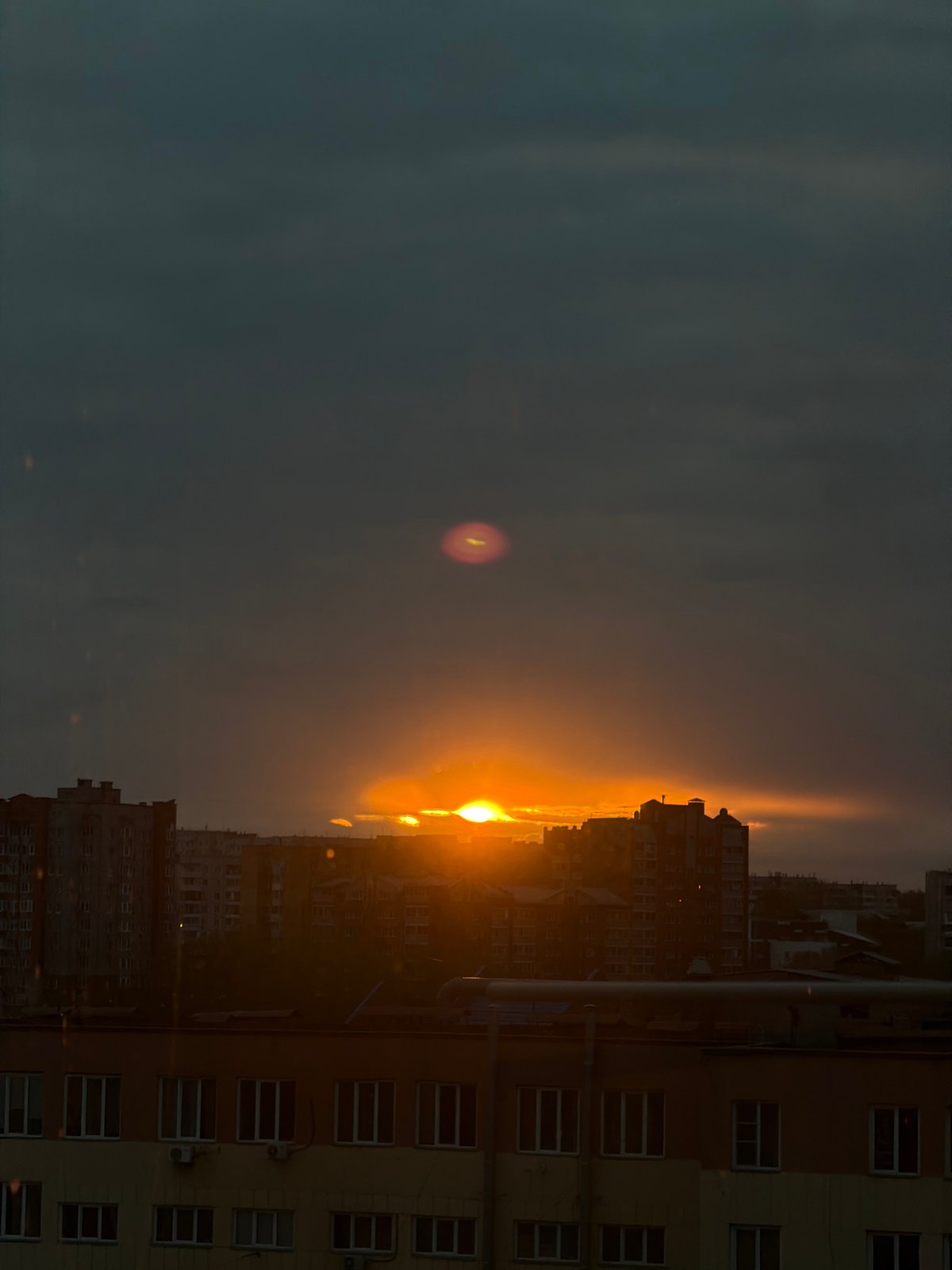 Sunset observed over Krasnoyarsk cityscape from multiple vantage points