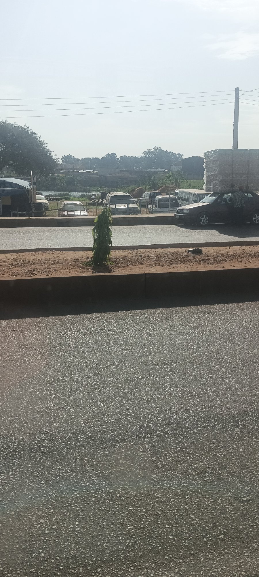 Morning street scenes documented in Bukuru, Nigeria show daily life