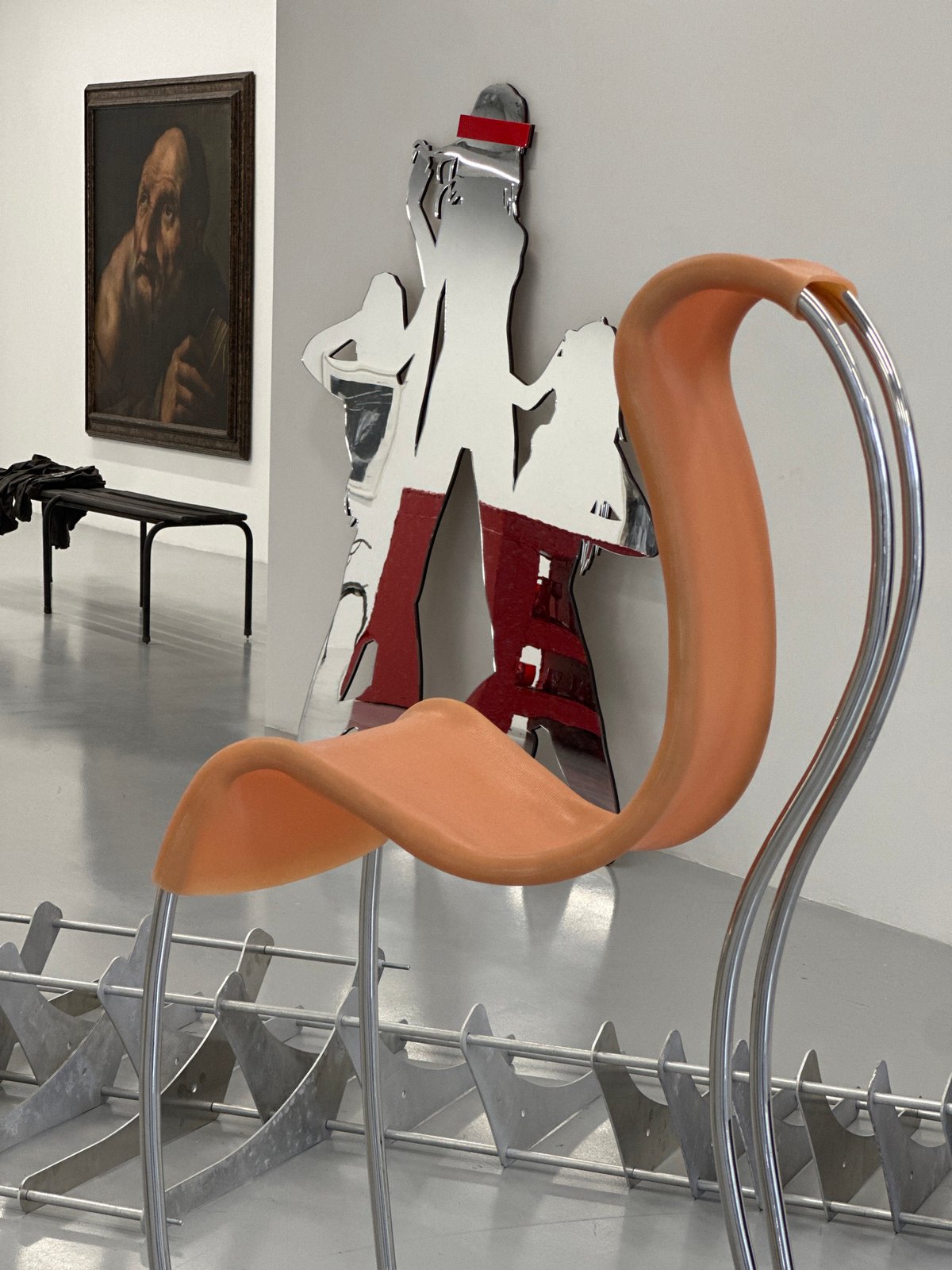 Gallery visitor documents art installations and specialty foods in London