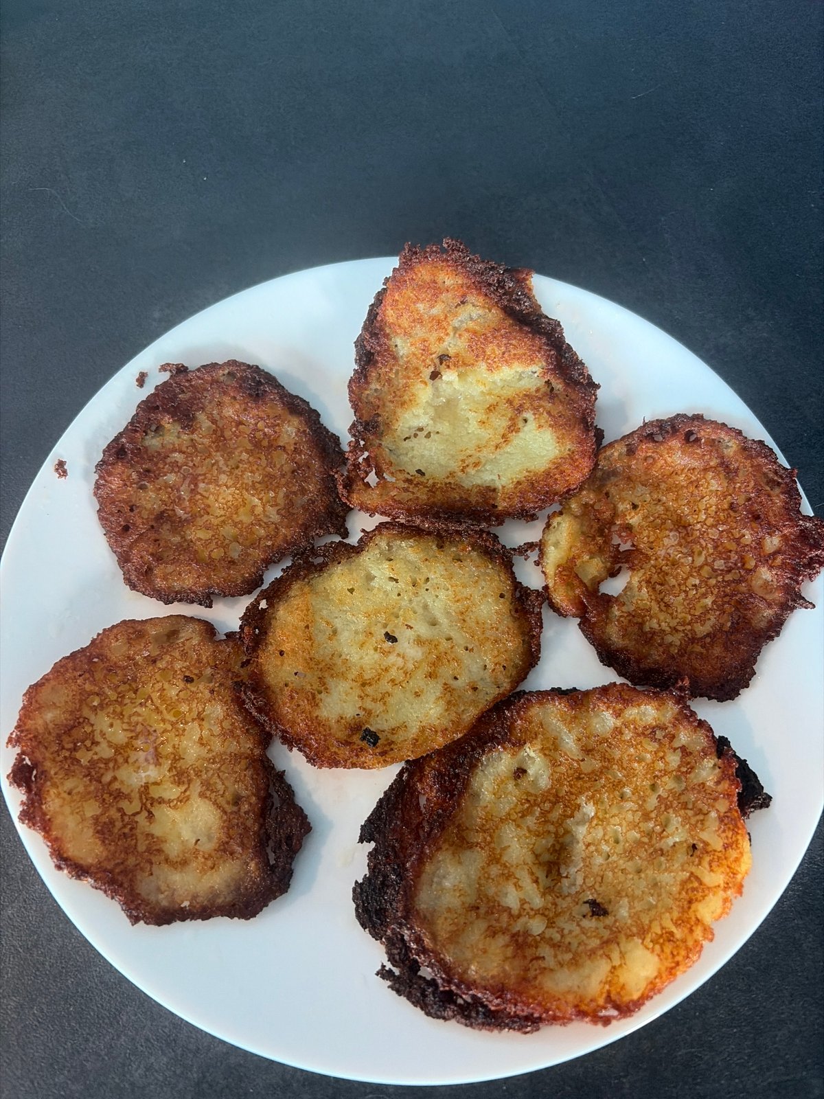 Potato pancakes photographed on white plate in Rijswijk