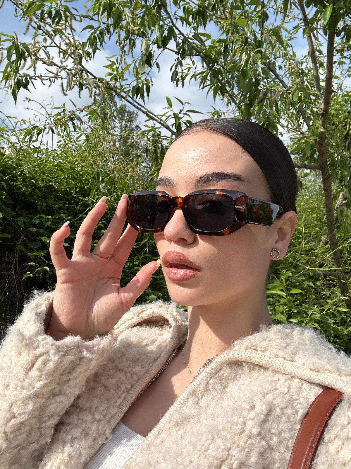 Woman in sunglasses and cream jacket spotted in Sofia