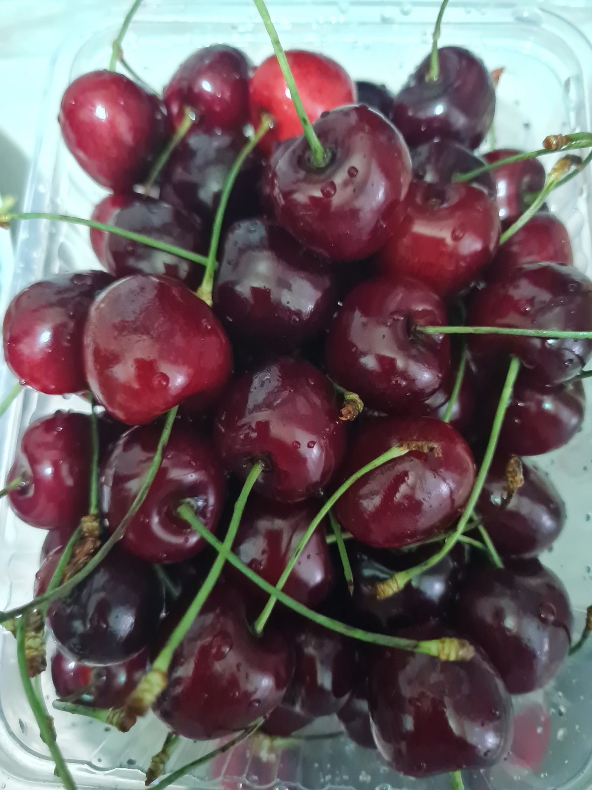 Freshly washed summer berries, close-up and overhead, Moscow