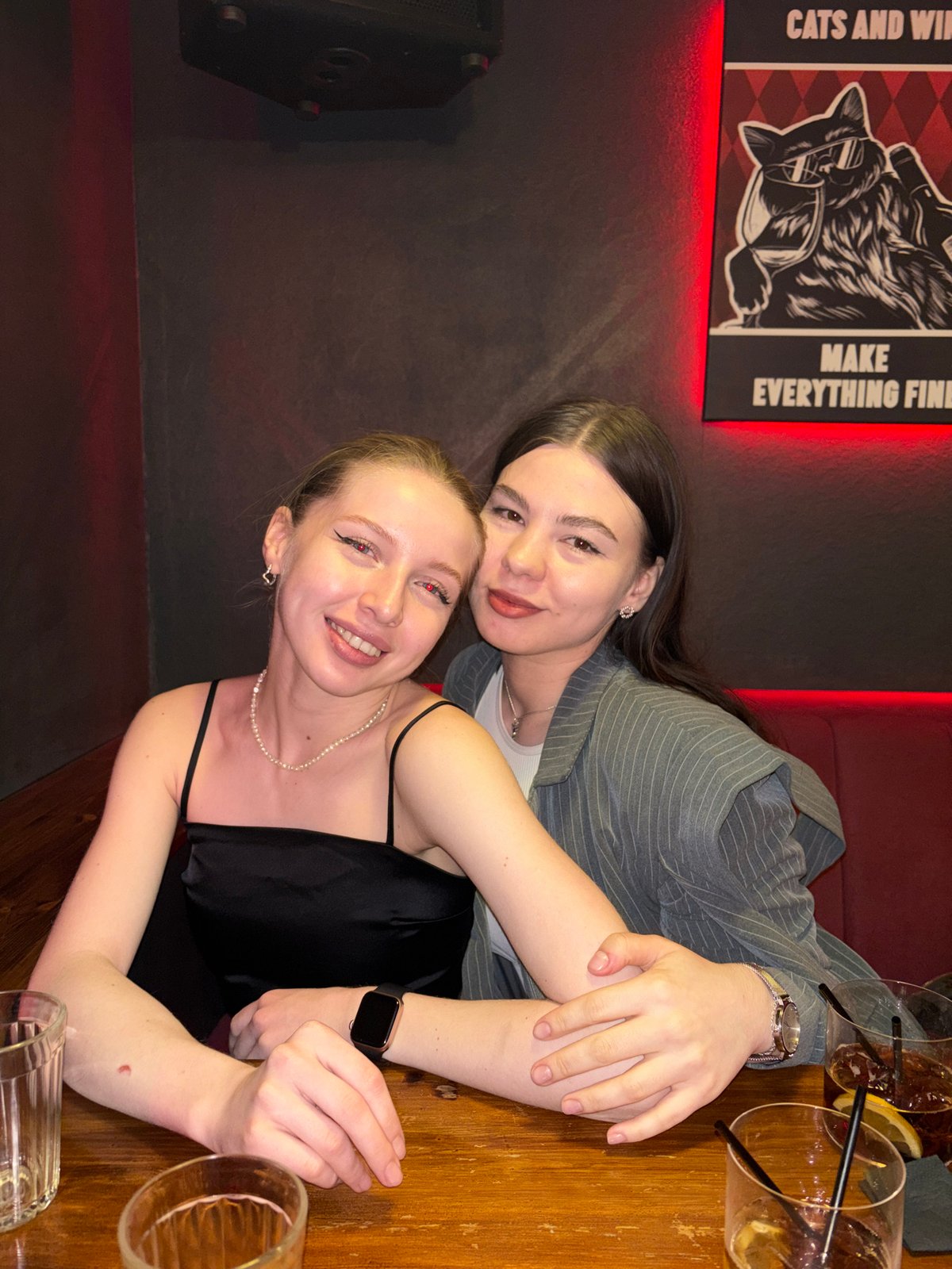 Two women photographed at Perm restaurant table