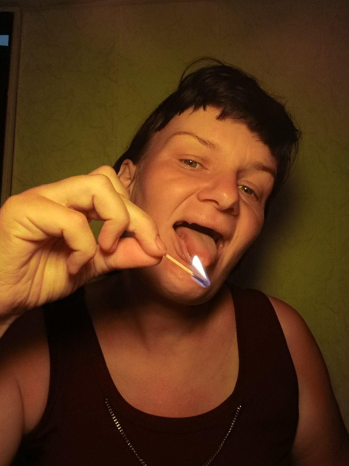 Woman poses with household items in Russian town morning session