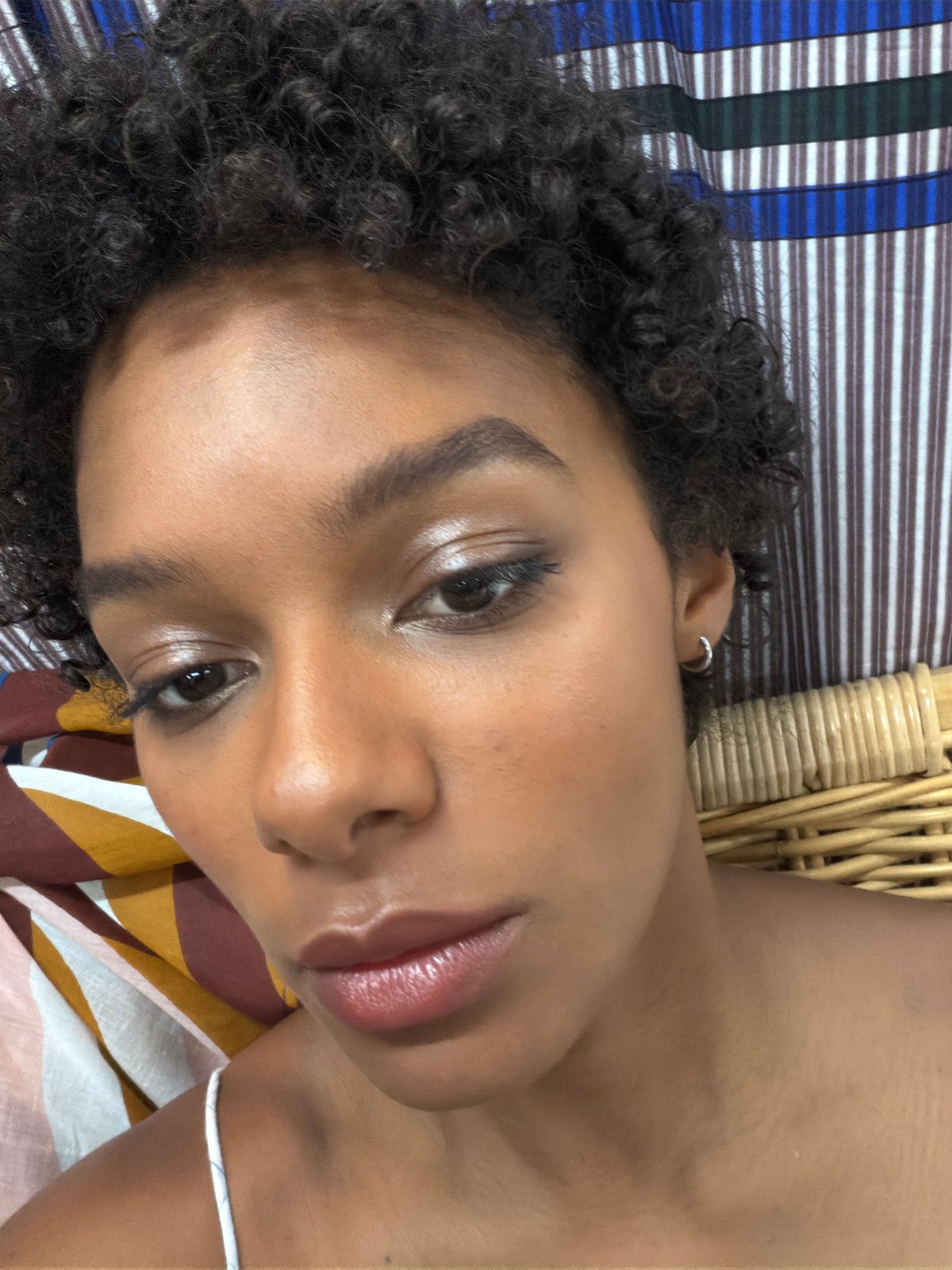 Relaxed indoor selfie with a Dutch-angle twist