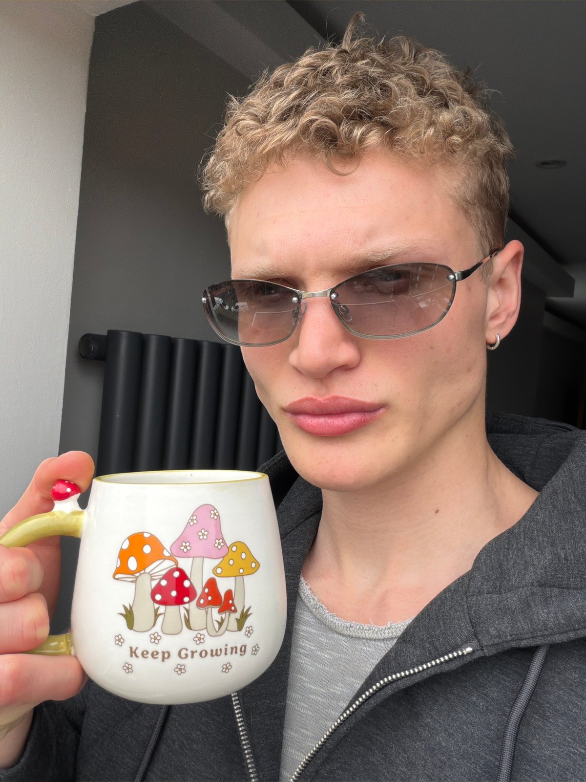 Person spotted with motivational mushroom mug in central London