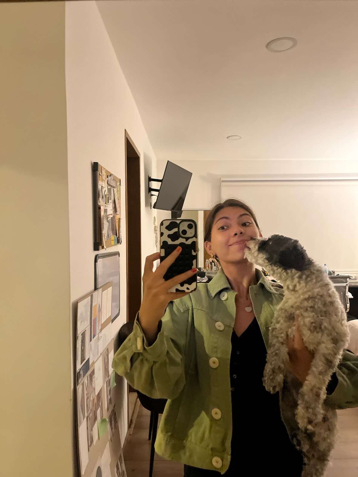 Woman takes late-night selfie with dog in Mexico home