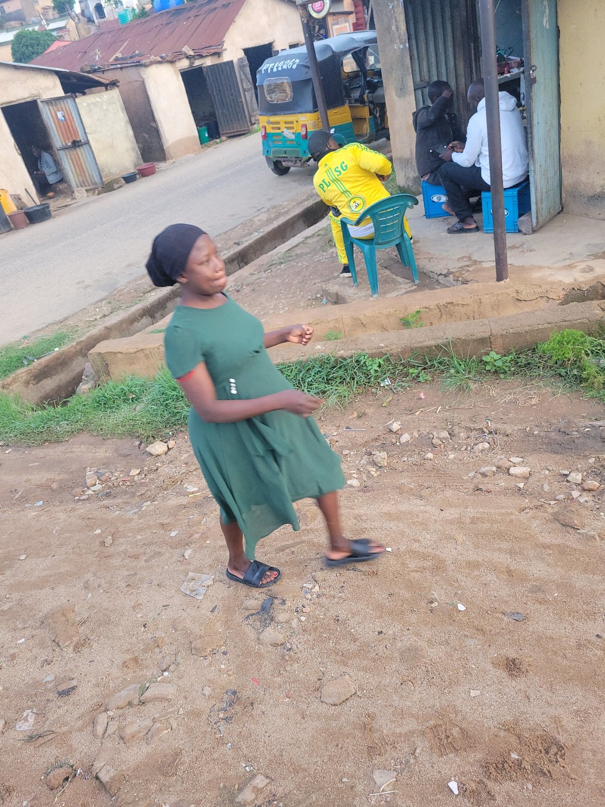 Afternoon street life documented across Jos, Nigeria neighborhoods