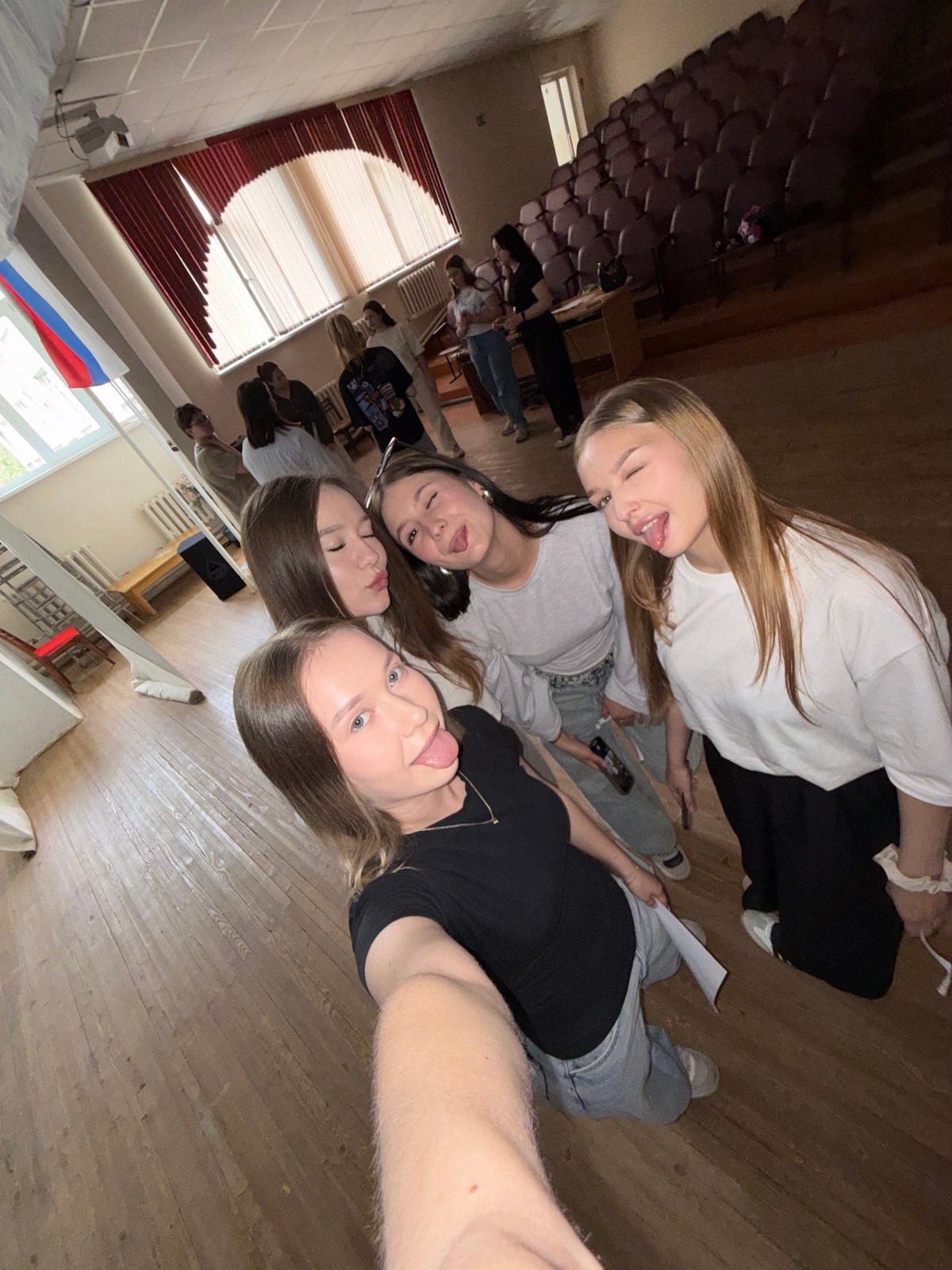 Young women document casual moments across Chaikovsky, Russia venues