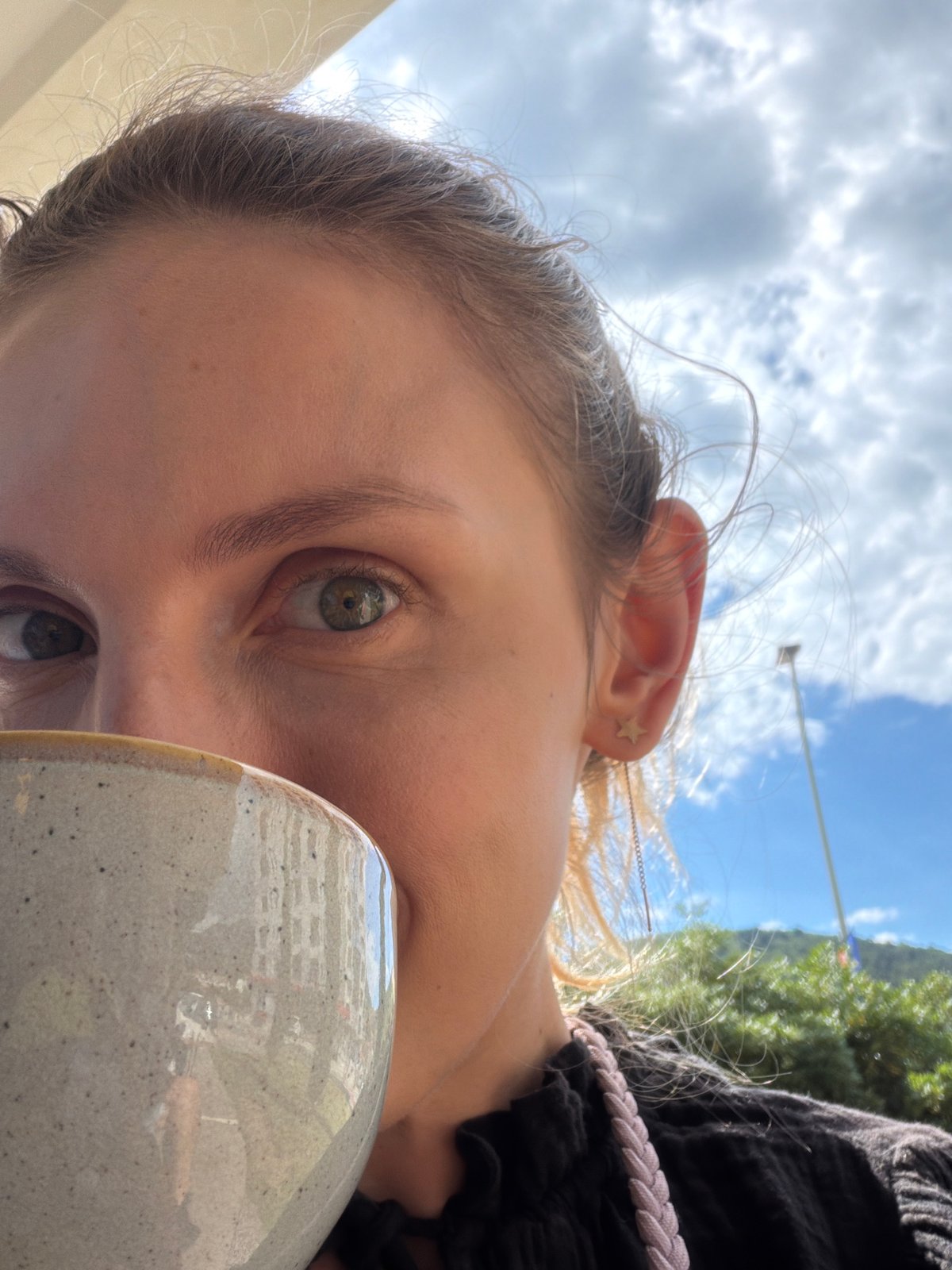 Everyday life unfolds across Budva: coffee, construction, salon visits