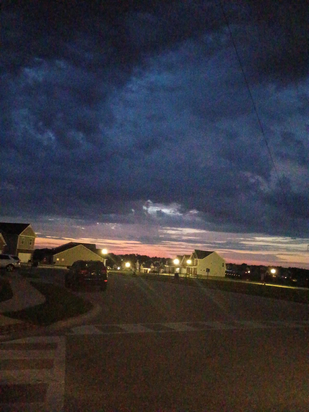 Richmond neighborhood at dusk, July 4th evening sky