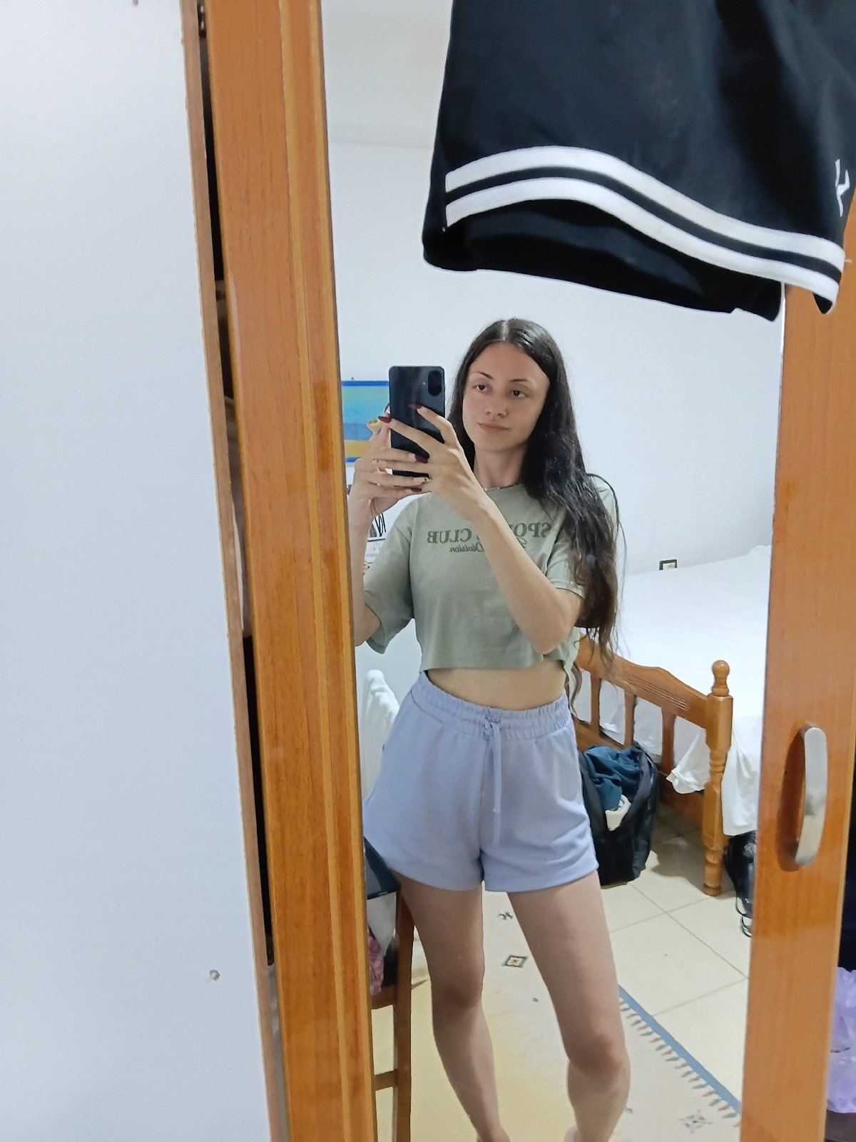 Woman captures selfies and outdoor portraits in Vlora, Albania