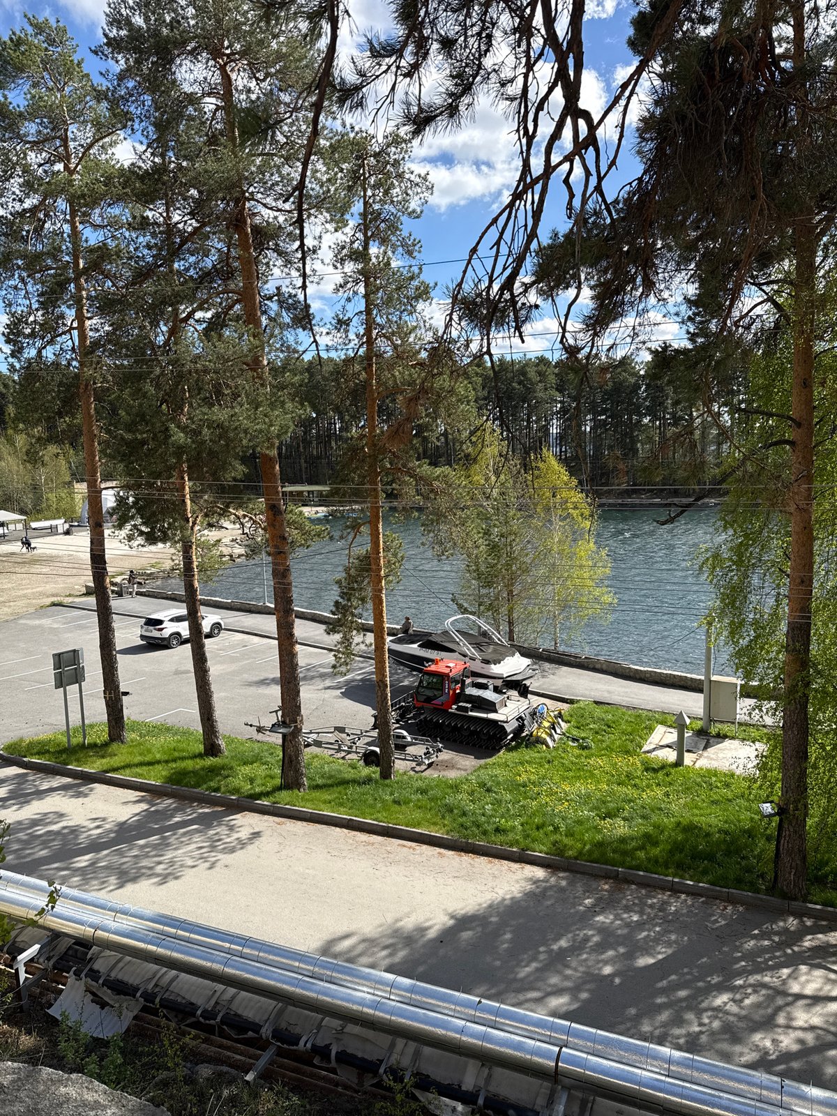 Visitor documents scenic Lake Turgoyak pine forests in Russia