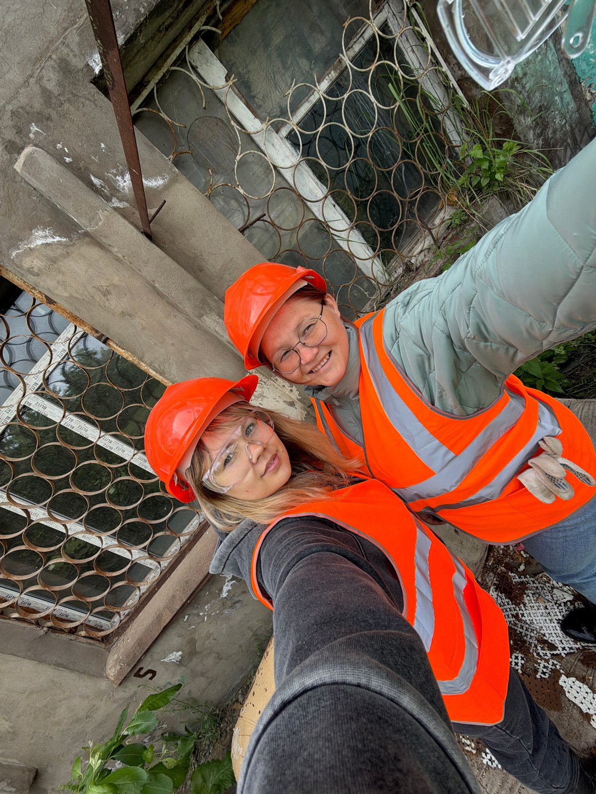 Women Document Safety Work at Demolition Site in Chaikovsky
