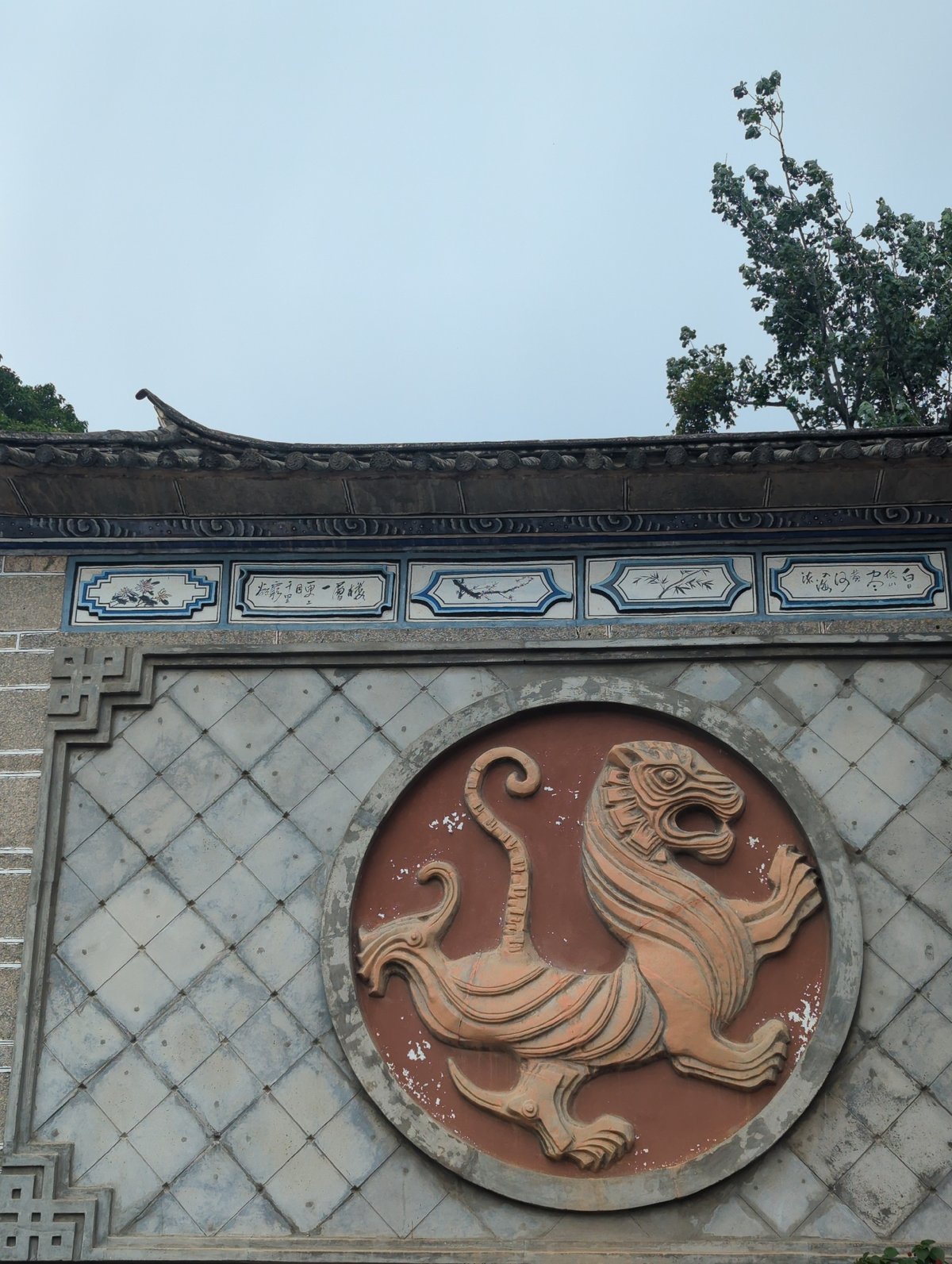 Traditional carvings and ornate doors at a Xishan heritage site
