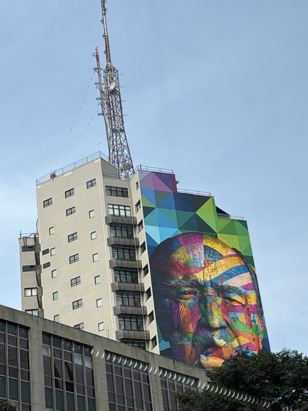 São Paulo street corner: murals, mid-century buildings, urban detail