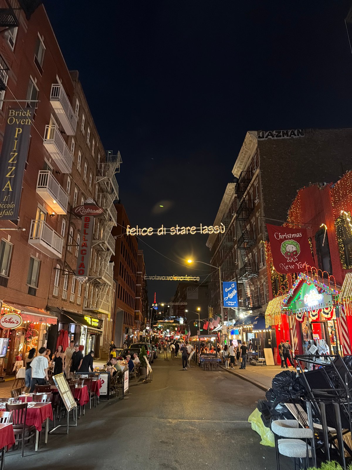 Little Italy's Mulberry Street lit up at night