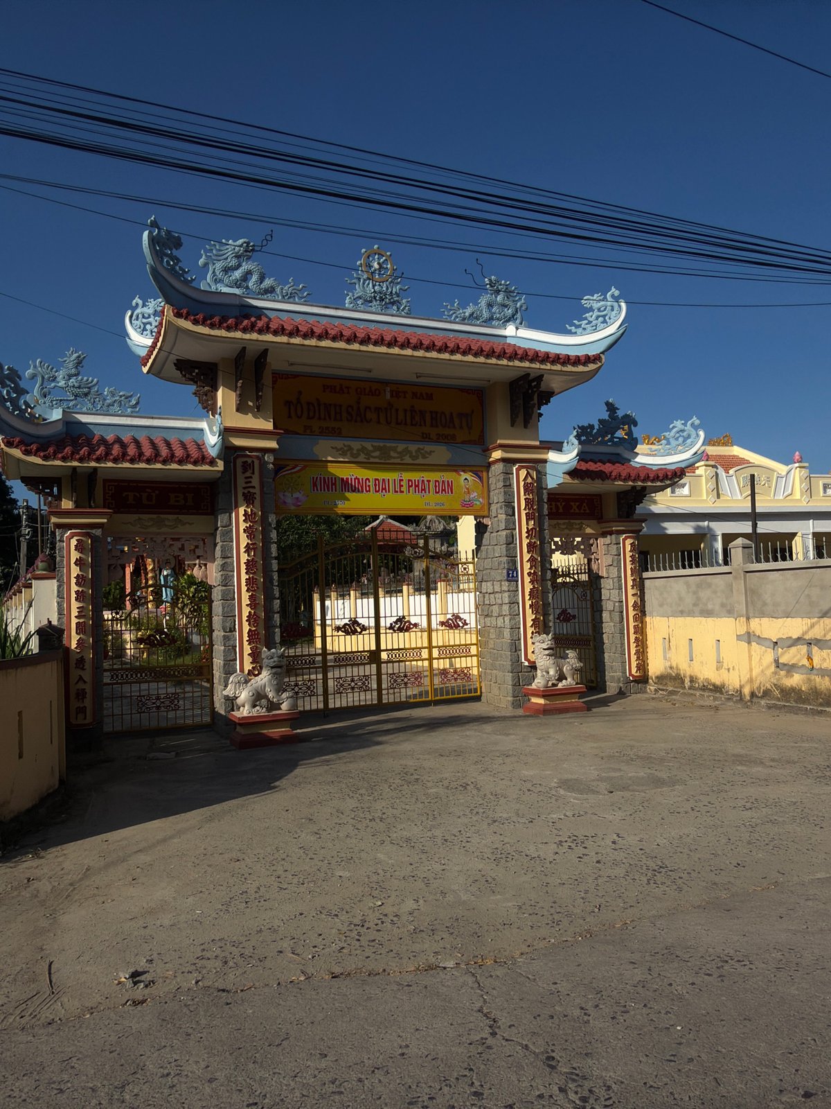 Temple gate and a PS5 delivery, Nha Trang streets