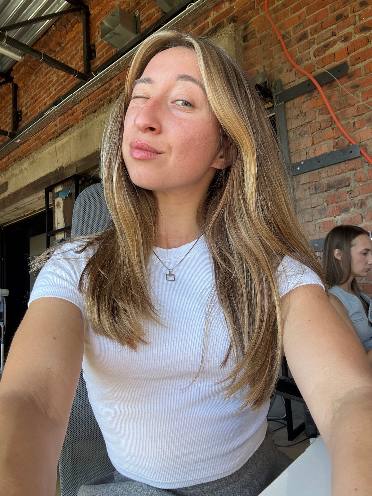 Selfies and workspace shots from an industrial-style office in Chaikovsky