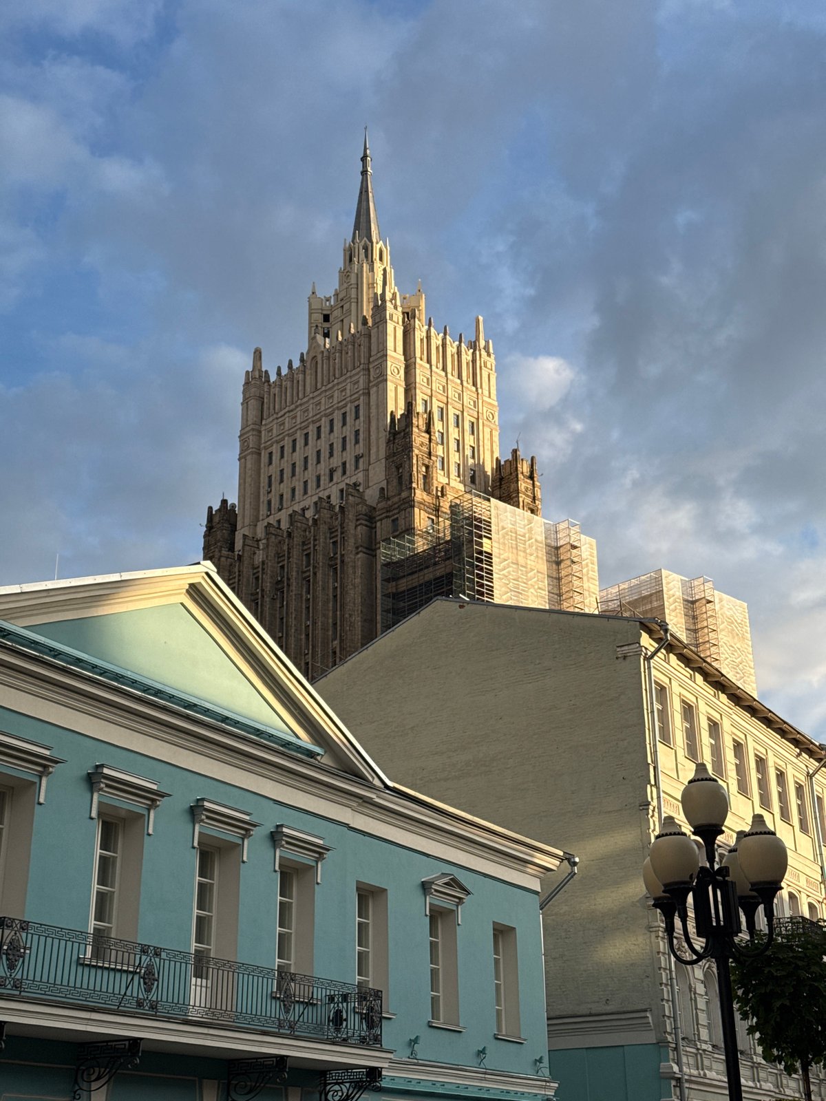 Moscow architecture and bronze statue documented in afternoon light
