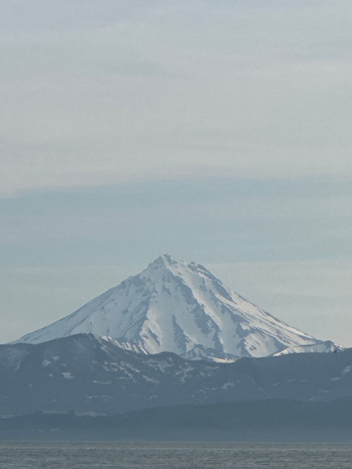 Morning light over Kamchatka's waterfront and volcanic skyline