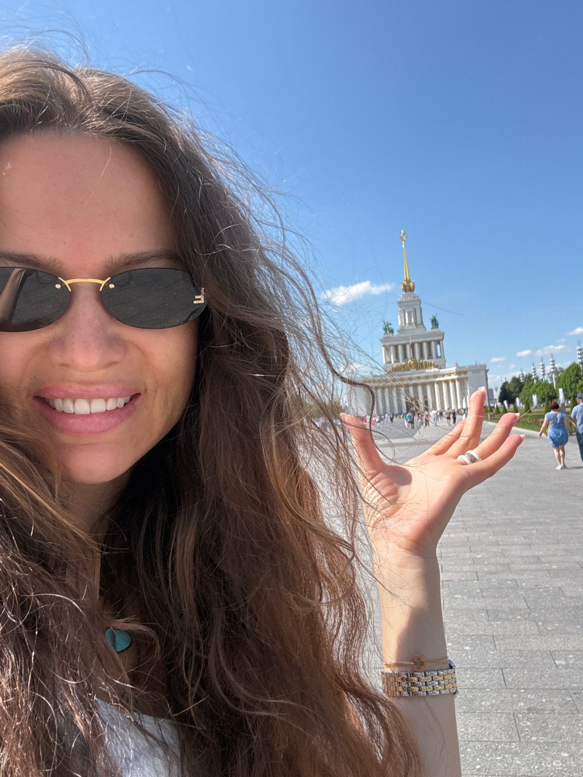 Exploring VDNKh's monuments and fountains on a sunny Moscow morning