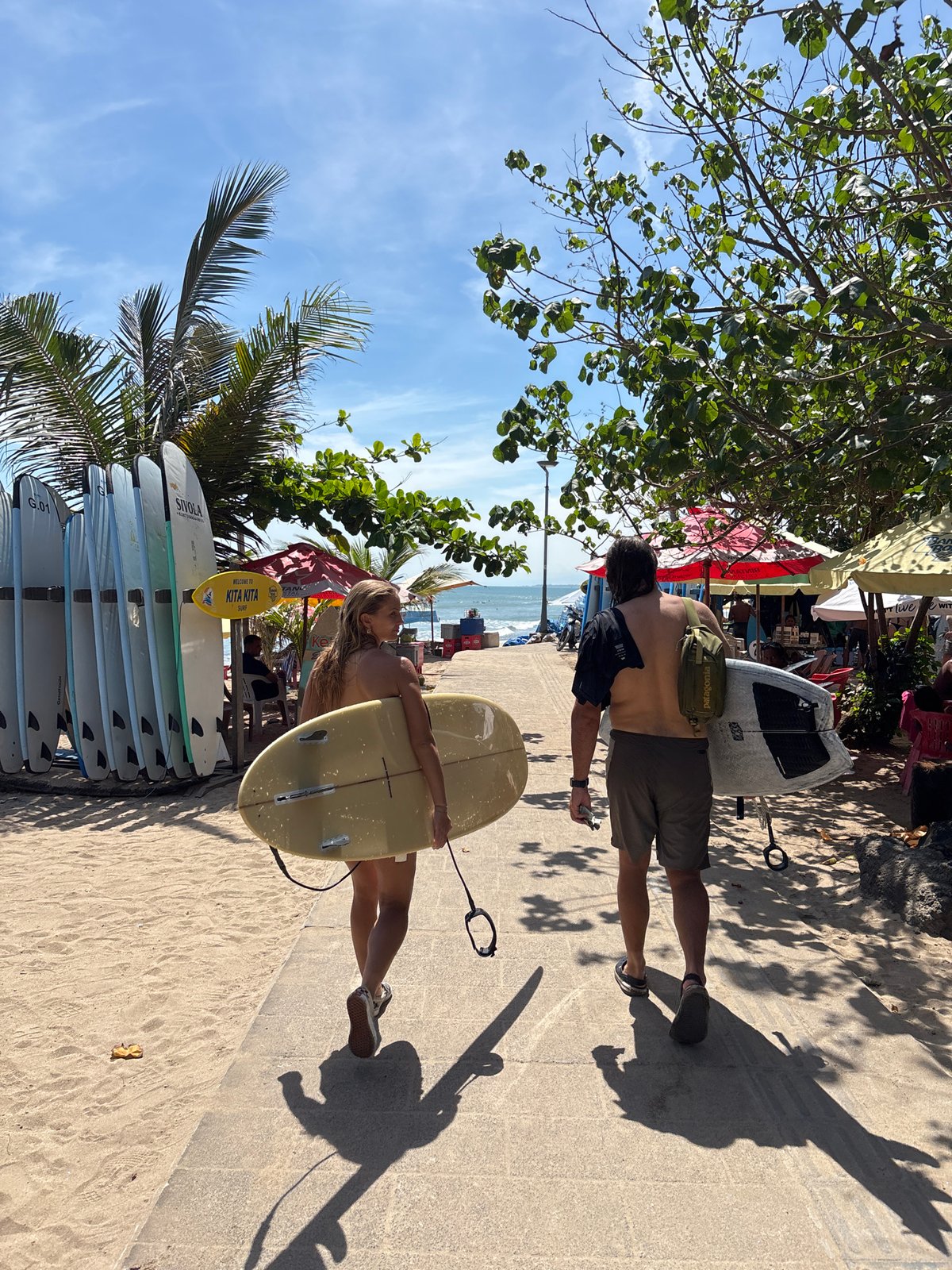 Early morning surf activity captured across Kuta beach