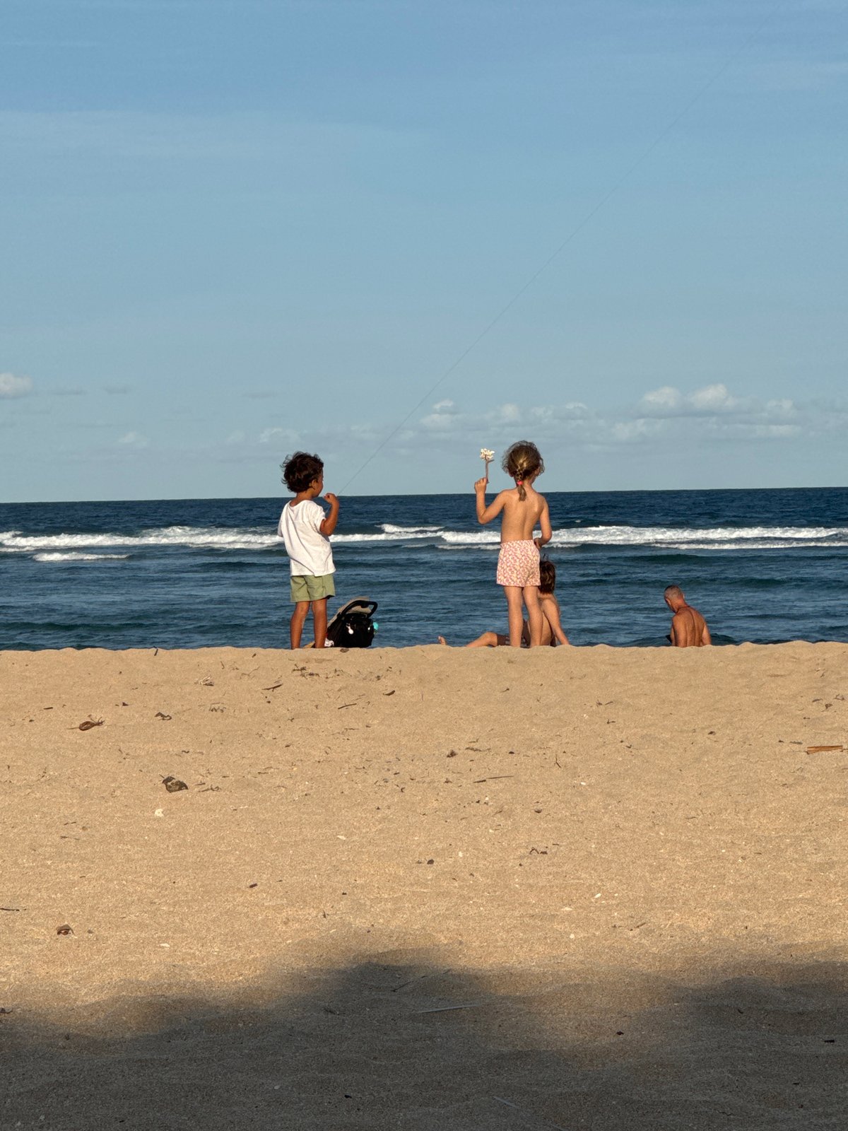 Beach wedding and morning activities observed in Kuta Selatan