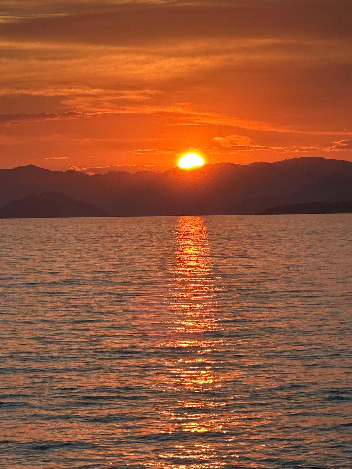 Sunset over the Aegean from Fethiye's pebbly shore