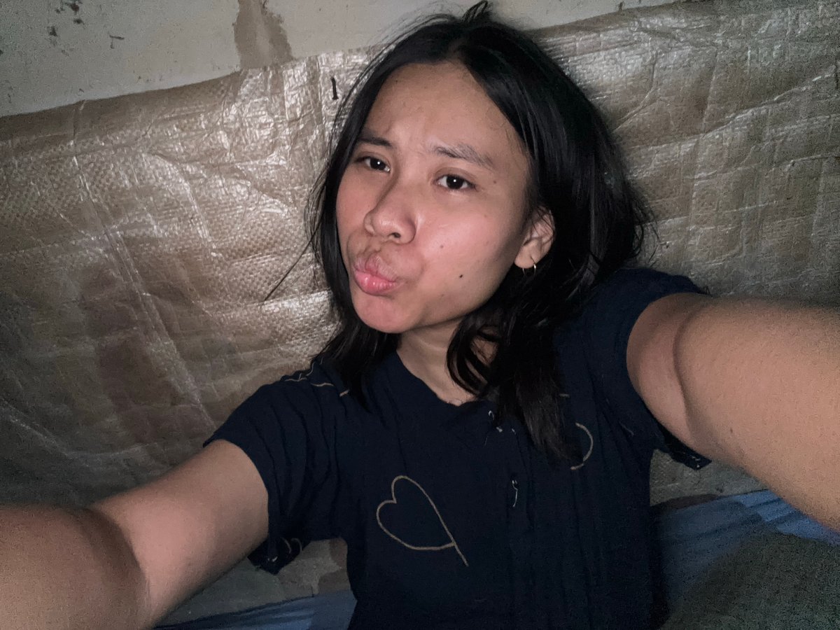 Selfie session in a bare indoor space, East Jakarta