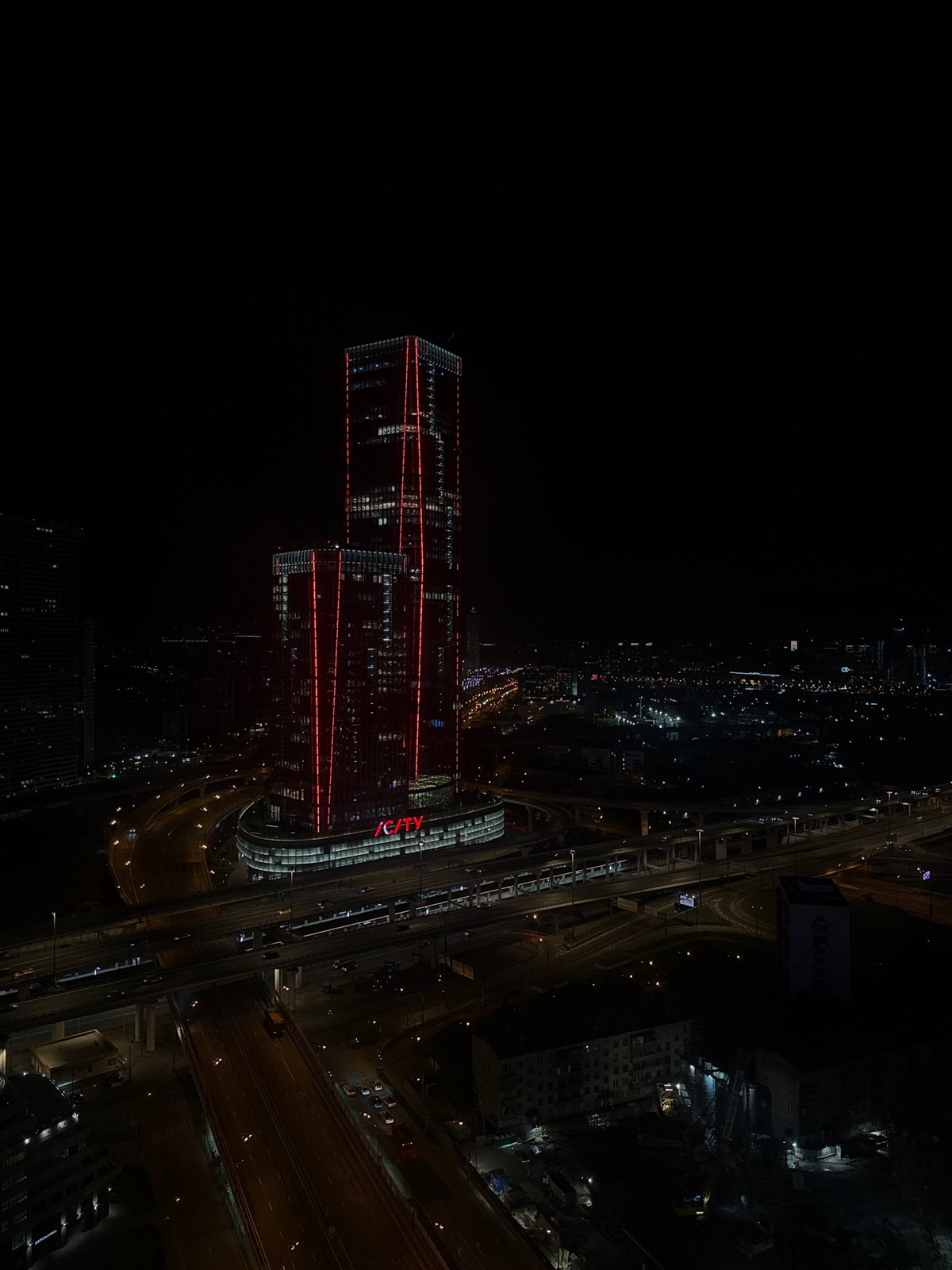 Nighttime aerial views captured of illuminated Khimki cityscape